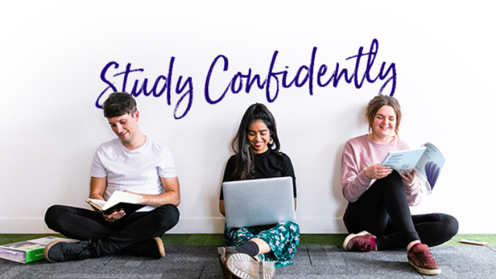 3 Students sat against a wall, each using a laptop or reading study texts. The words Study Confidently appear on the wall behind them.
